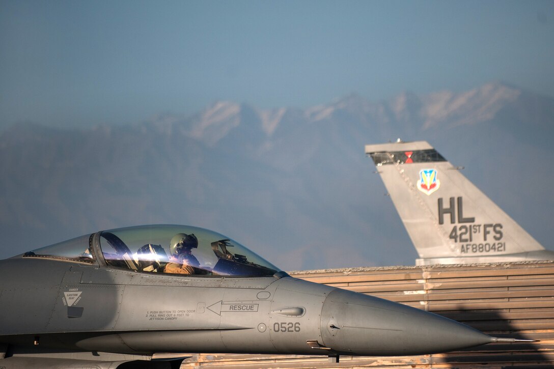 U.S. Air Force Lt. Col. Michael Meyer performs preflight checks on an F-16 Fighting Falcon aircraft on Bagram Airfield, Afghanistan, Oct. 30, 2015. Myers is commander, 421st Expeditionary Fighter Squadron. U.S. Air Force photo by Tech. Sgt. Joseph Swafford