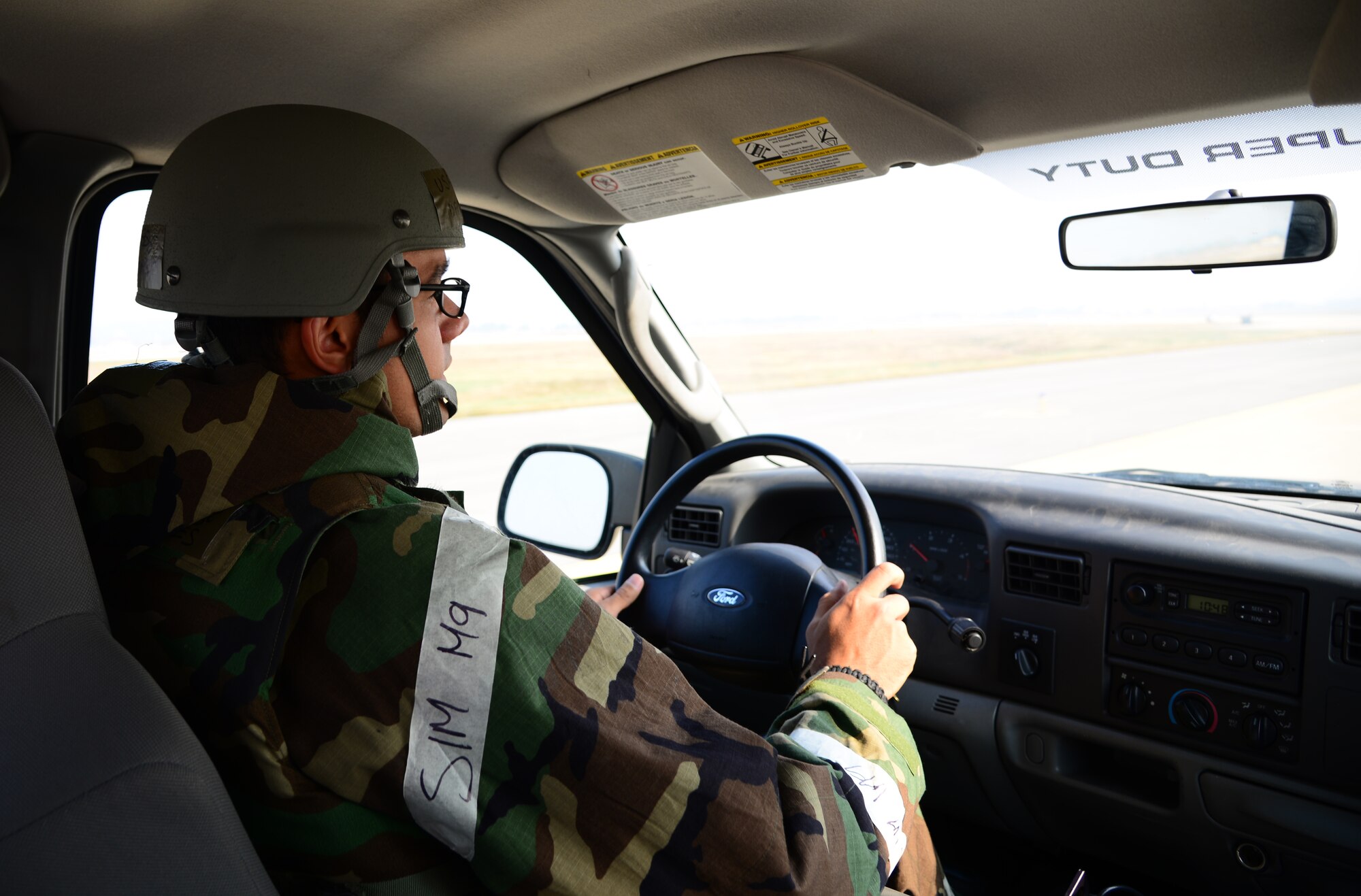 Staff Sgt. David Morales, 51st Operations Support Squadron airfield management operations supervisor, performs a flightline check Nov. 3, 2015, at Osan Air Base, Republic of Korea. The 51st Fighter Wing is participating in readiness exercise Vigilant Ace 16, a large-scale exercise designed to enhance the interoperability of the U.S. and Republic of Korea Air Forces. (U.S. Air Force photo/Staff Sgt. Benjamin Sutton)