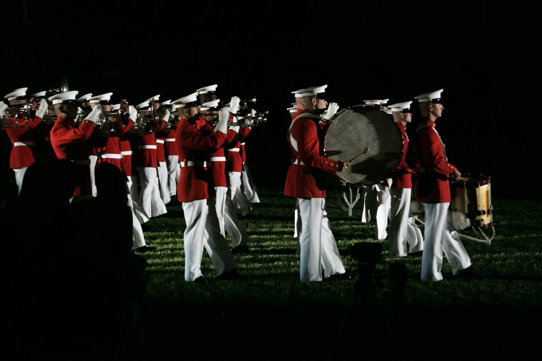 The United States Marine Drum & Bugle Corps performs during a Friday Evening Parade at Marine Barracks Washington, D.C., May 22, 2015. (U.S. Marine Corps photo by Cpl. Christian Varney/ Released)