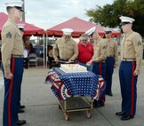 Marine Depot Maintenance Command leaders and its workforce observe the Marine Corps’ 240th birthday with a traditional cake-cutting ceremony in front of the command’s headquarters, Nov. 3. 