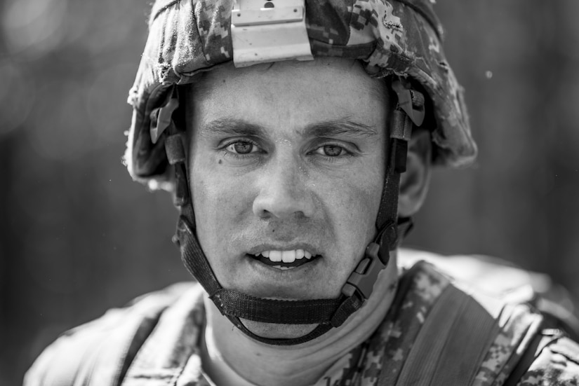 Staff Sgt. Andrew Fink, 409th Area Support Medical Company, a native of Cook, Minn., stands for a portrait after finishing a 10-kilometer foot march in the North Carolina heat May 5 during the 2015 Army Reserve Best Warrior Competition at Fort Bragg. This year's Best Warrior Competition will determine the top noncommissioned officer and junior enlisted Soldier who will represent the Army Reserve in the Department of the Army Best Warrior Competition later this year at Fort Lee, Va. (U.S. Army photo by Sgt. 1st Class Michel Sauret)
