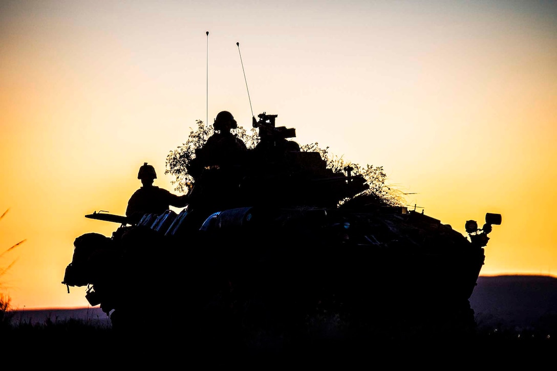 An armored vehicle sits on the horizon during Trident Juncture 2015 in Almería, Spain, Oct. 30, 2015. The exercise enabled Reserve Marines to gain experience within their military occupational specialty and demonstrate their readiness with other foreign nationals. The vehicle is assigned to the 4th Marine Division. U.S. Marine Corps photo by Cpl Gabrielle Quire
