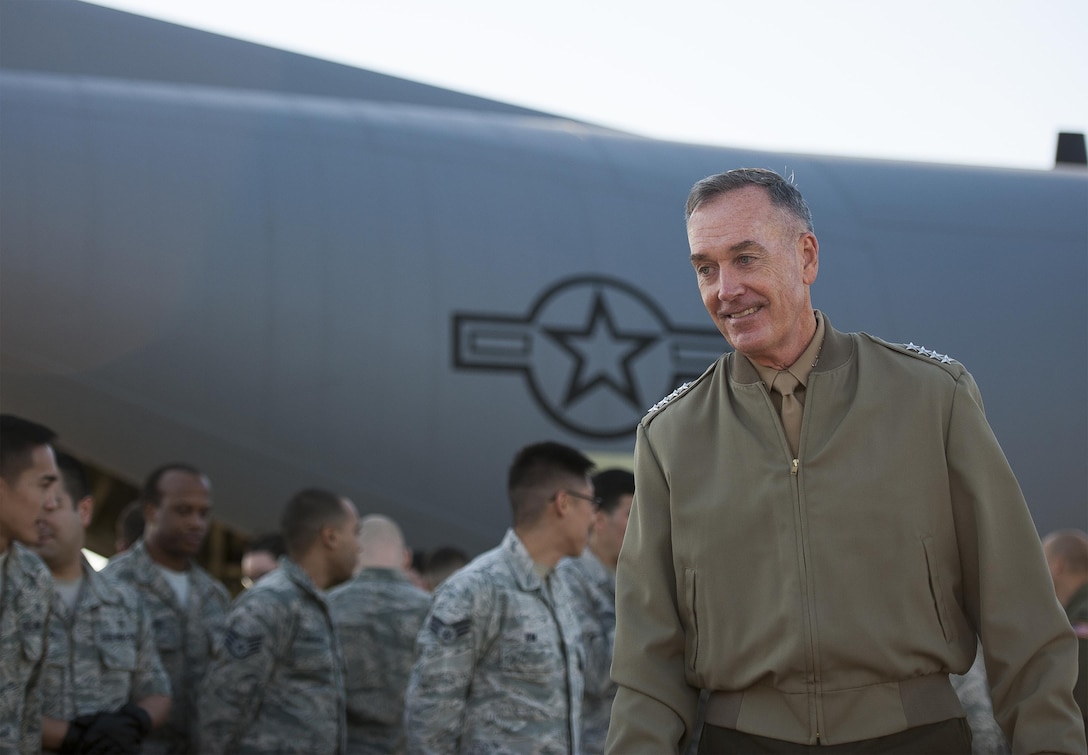 U.S. Marine Corps Gen. Joseph F. Dunford Jr., chairman of the Joint Chiefs of Staff, meets on the flightline of Yokota Air Base, Japan, with U.S. airmen assigned the 374th Airlift Wing, Nov. 4, 2015. DoD photo by U.S. Navy Petty Officer 2nd Class Dominique A. Pineiro