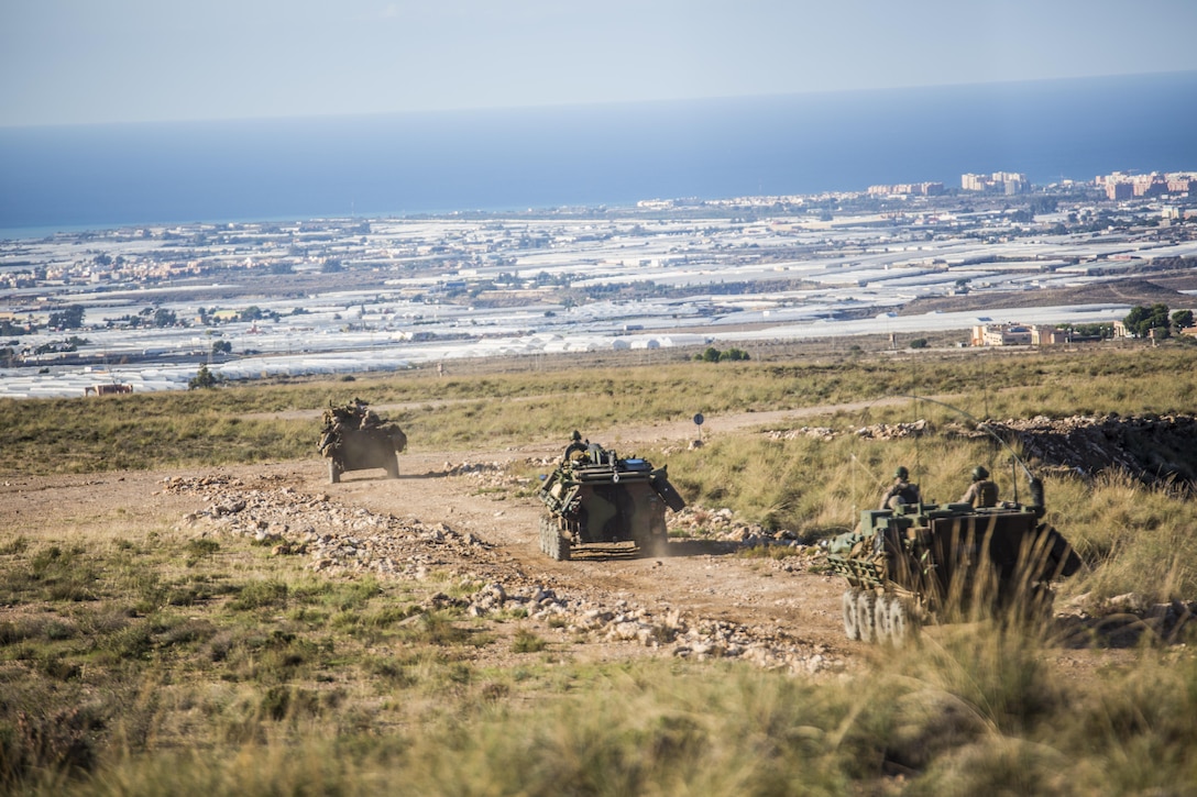 Marines with 4th Light Armored Reconnaissance Battalion, 4th Marine Division, convoy during their final exercise in Trident Juncture, Oct. 28, 2015. The simulated exercise taught the Marines each other’s strengths and weaknesses, allowing them to seek improvement as well as build interoperability among the warfighters.