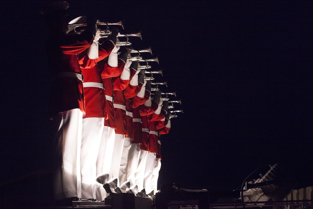 Soprano buglers with the U.S. Marine Corps Drum and Bugle Corps perform "Rooftop Fanfare" during the evening parade at Marine Barracks Washington, D.C., May 29, 2015. (U.S. Marine Corps photo by Lance Cpl. Kayla McTaw/Released)