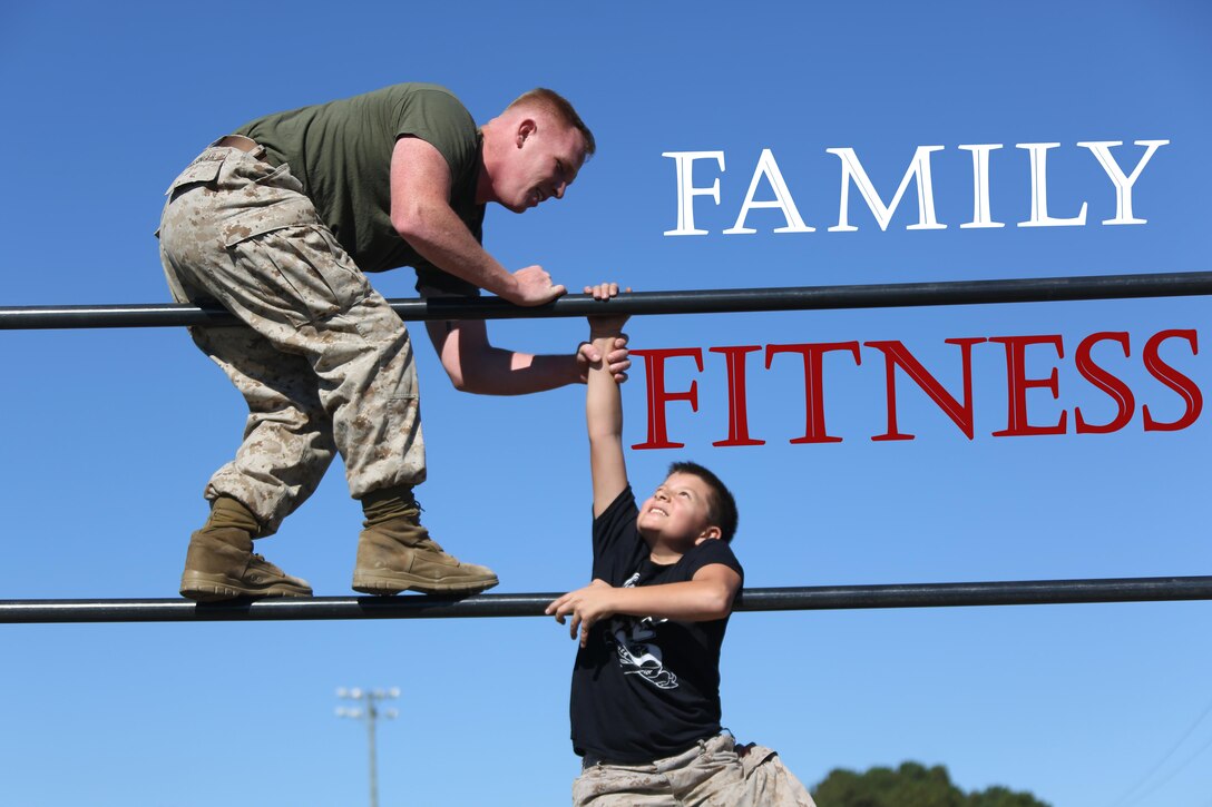 Sgt. Joshua Kessinger aids D’Angelo, 10, over an obstacle during the Marine Wing Headquarters Squadron 2’s Warrior Day at Marine Corps Air Station Cherry Point, N.C., Oct.30, 2015. Marines with MWHS-2 hosted an interactive day where families could participate in some of the routine training Marines undergo. Marines use obstacle courses as part of their routine physical exercise as it tests their physical endurance and teamwork. Kessinger is a Chemical, biological, radiological, nuclear specialist and D’Angelo is the brother of Cpl. Raquel Mathieu, and intelligence specialist, both with the squadron. (U.S. Marine Corps photo by Cpl. N.W. Huertas/ Released)