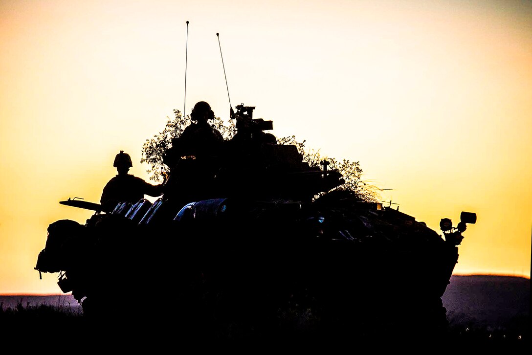 An armored vehicle sits on the horizon during Trident Juncture 2015 in Almería, Spain, Oct. 30, 2015. The exercise enabled Reserve Marines to gain experience within their military occupational specialty and demonstrate their readiness with other foreign nationals. The vehicle is assigned to the 4th Marine Division. U.S. Marine Corps photo by Cpl Gabrielle Quire