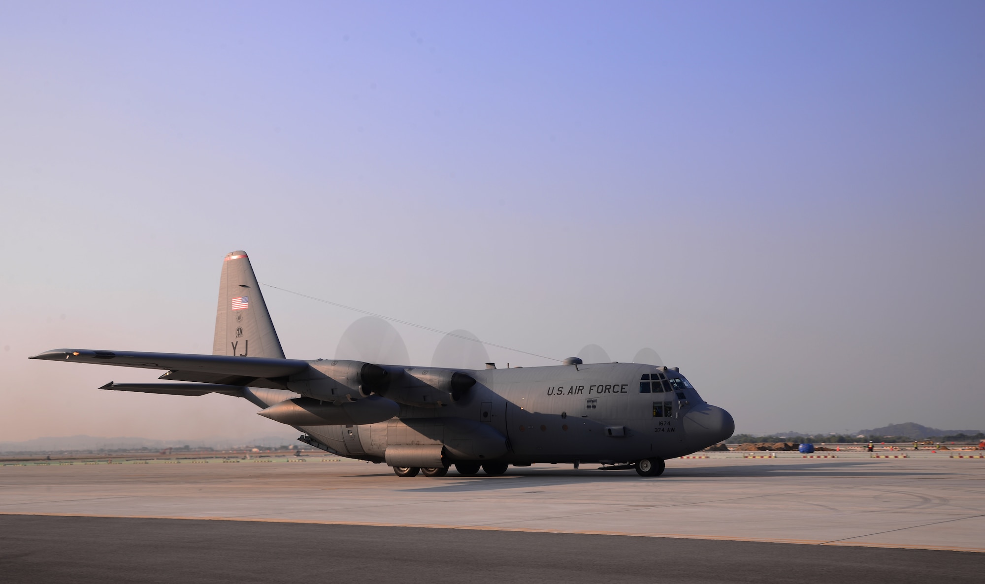 A C-130 Hercules from Yokota Air Base, Japan, taxis the runway Nov. 3, 2015, at Osan Air Base, Republic of Korea. Airmen assigned to the 731st Air Mobility Squadron performed an engine running offload as part of the readiness exercise Vigilant Ace 16. Vigilant Ace 16 is a large-scale exercise designed to enhance combat capabilities and interoperability of the U.S. and Republic of Korea Air Forces. (U.S. Air Force photo by Staff Sgt. Benjamin Sutton/Released)