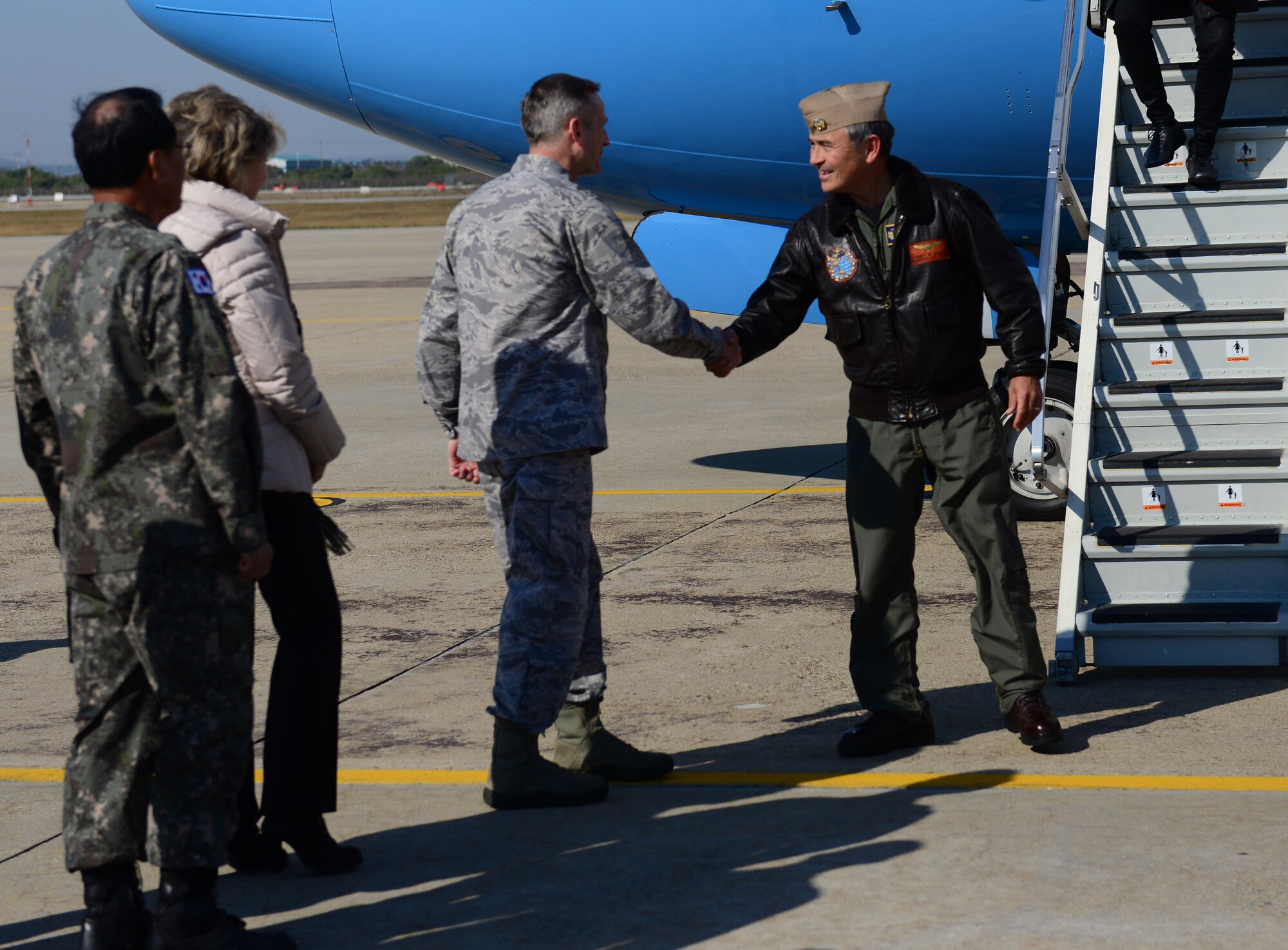 U.S. Navy Adm. Harry B. Harris Jr., U.S. Pacific Command commander, greets Lt. Gen. Terrence J. O'Shaughnessy, 7th Air Force commander, at Osan Air Base, Republic of Korea, Oct. 31, 2015. Harris’s visit coincided with senior-level, bilateral defense talks between the U.S. and ROK at the 40th Military Committee Meeting and the 47th Security Consultative Meeting held in Seoul, Nov. 1 and 2, respectively. After his arrival, Harris immediately inspected dormitory 708, meeting Airmen dorm residents and discussing the status of the living facilities. (U.S. Air Force photo/Staff Sgt. Amber Grimm)