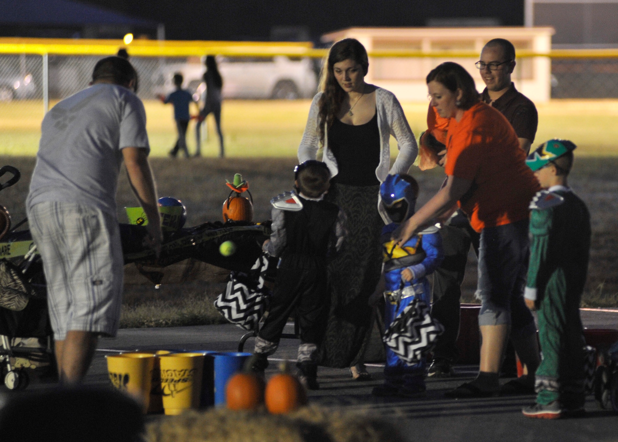 The 325th Force Support Squadron Youth Center hosted Fallfest Oct. 30 outside the Youth Center. An estimated 1,300 attendees, dressed from scary zombies to princesses, came to join the festivities that included food booths, carnival games, face-painting, a fire pit for making s’mores and a spooky haunted trail. (U.S. Air Force photo by Senior Airman Sergio A. Gamboa/Released)