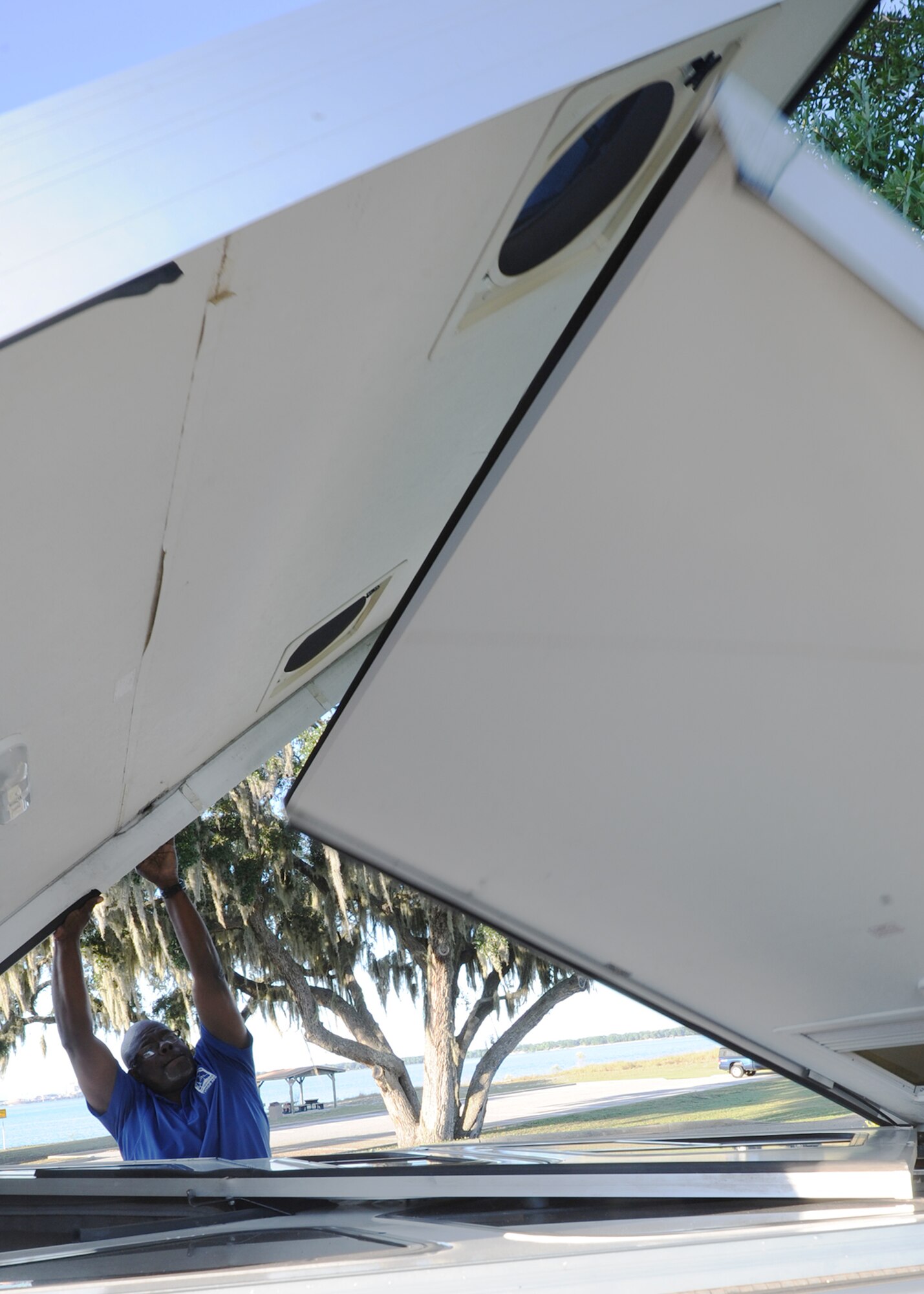 Gary Williams, 325th Force Support Squadron outdoor recreation manager, assembles a portable camper Nov. 3 at the Bonita Bay Outdoor Recreation Complex. Williams is a retired Air Force master sergeant and native Panama City, Florida. During active duty, Williams was selected to be a part of the F-15 Eagle aerial demonstration team visiting various countries around the globe along with the Thunderbirds and Blue Angels. (U.S. Air Force photo by Senior Airman Ty-Rico Lea/Released)