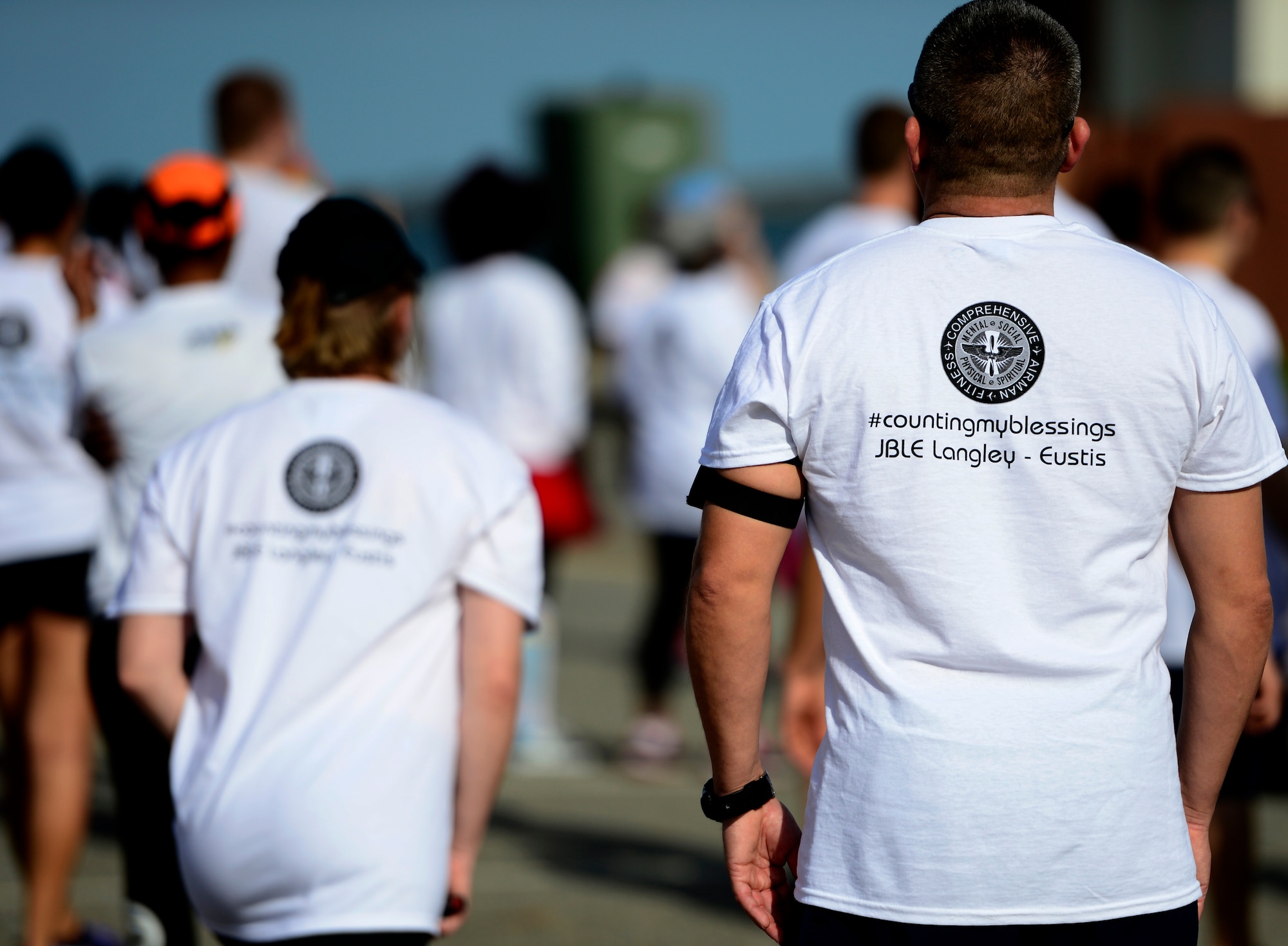 Participants stretch prior to the Joint Base Langley-Eustis Resiliency 5K Color Run at Langley Air Force Base, Va., Oct. 29, 2015. The run aimed to boost morale and promote healthy lifestyles for the JBLE community. (U.S. Air Force photo by Senior Airman Kayla Newman/Released)