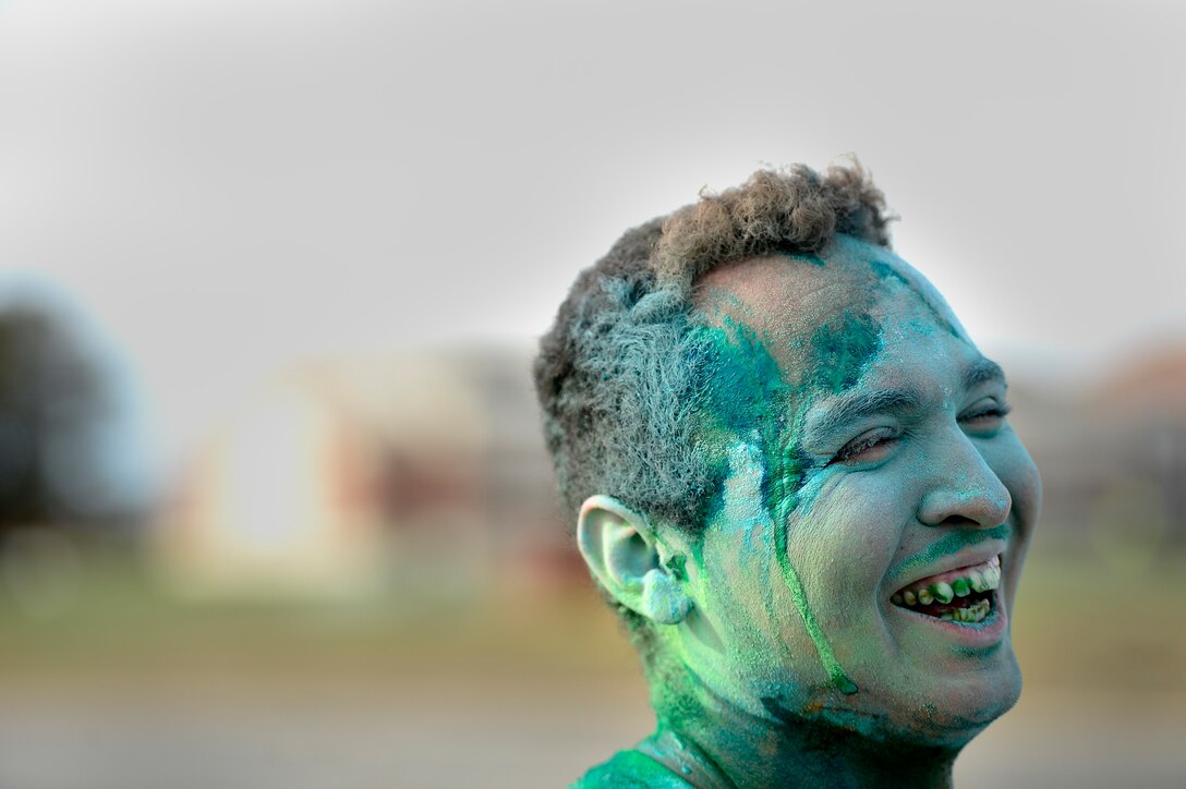 U.S. Air Force Senior Airman Arnold Sandoval, 633rd Force Support Squadron services journeyman, participates in the Joint Base Langley-Eustis Resiliency 5K Color Run at Langley Air Force Base, Oct. 29, 2015. A color run was designed to celebrate healthiness, happiness and individuality. (U.S. Air Force photo by Senior Airman Kayla Newman/Released)