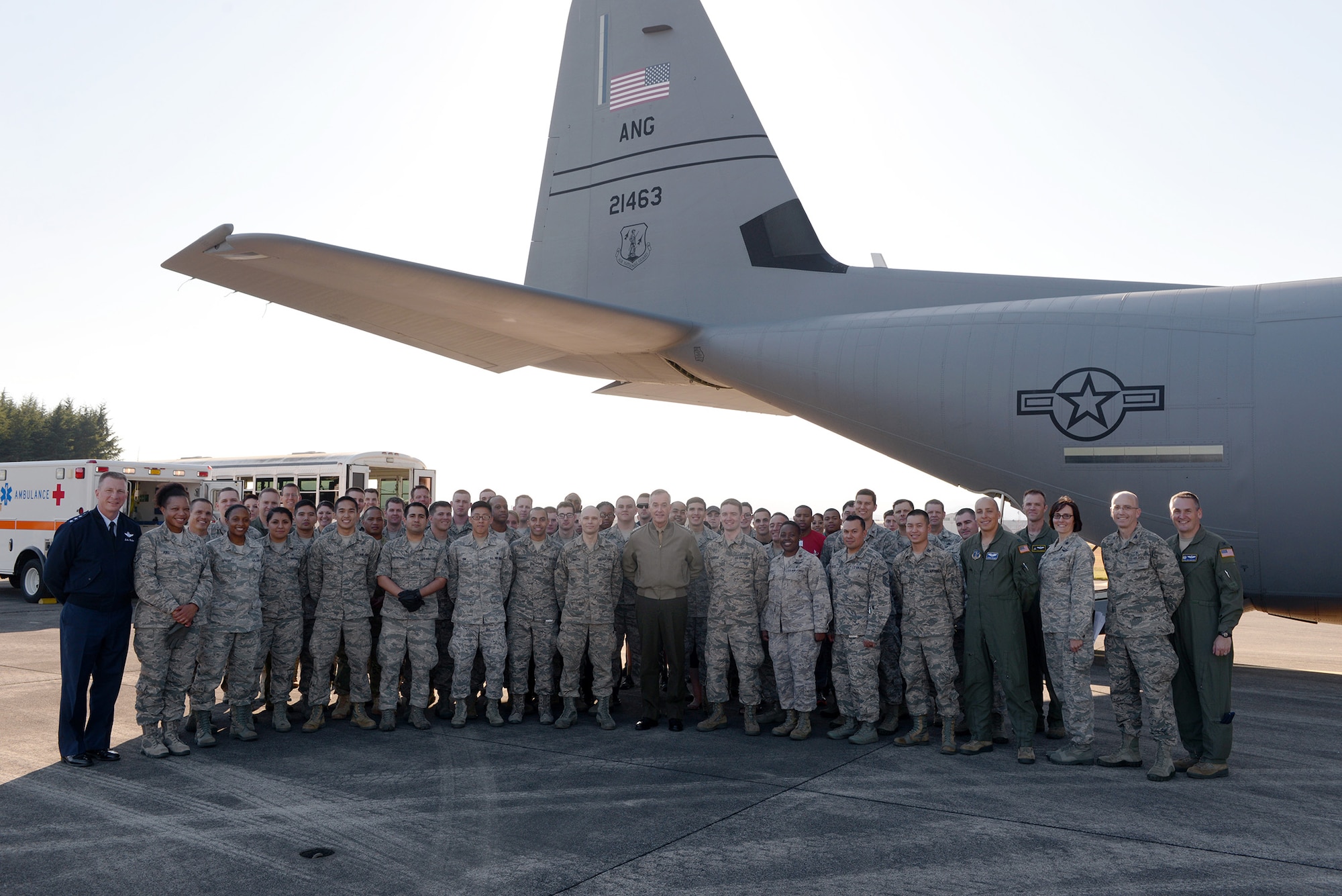 Marine Corps Gen. Joseph F. Dunford, the chairman of the Joint Chiefs of Staff, and Lt.
Gen. John Dolan, U.S. Forces, Japan commander, take a group photo with members of
the community at Yokota Air Base, Japan, Nov. 4, 2015. Dunford, the highest ranking
military member in the Department of Defense, took time to talk with service members
at Yokota, reminding them the importance of readiness and training. (U.S. Air Force
photo by Staff Sgt. Cody H. Ramirez/Released)