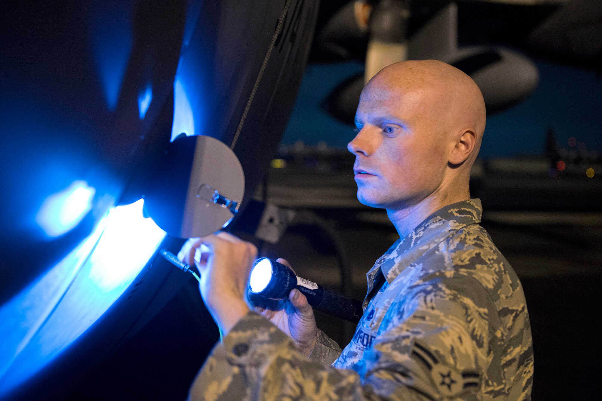 Airman 1st Class Christopher Cook, 374th Aircraft Maintenance Squadron crew chief, inspects a C-130 Hercules for any obvious physical damage or leaks and ensures all fasteners are sealed during VIGILANT ACE 16 at Yokota Air Base, Japan, Nov. 2 2015. Maintainers with the 374 AMXS always work 24 hours a day, 7 days a week, to ensure their C-130 fleet is ready to respond at a moment’s notice for any requirement in the Indo-Asia Pacific region. The exercise tested this readiness and Yokota's ability to receive and deploy forces throughout the theater. (U.S. Air Force photo by Staff Sgt. Cody H. Ramirez/Released)