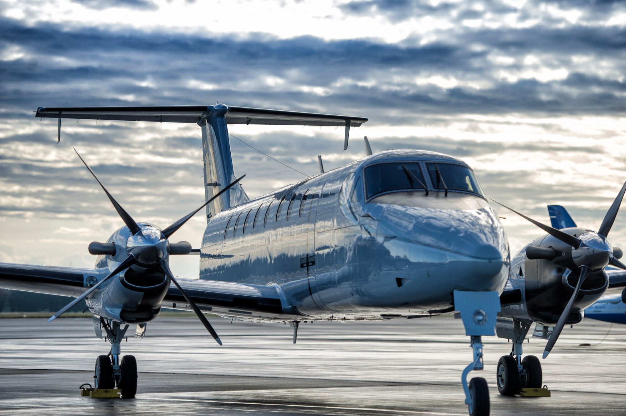 A C-12 Huron with the 459th Airlift Squadron sits parked at Iruma Air Base, Japan, Nov. 3, 2015. The 459th AS featured a UH-1N Huey and the C-12 Huron as static displays during the annual Iruma Air Show. (U.S. Air Force photo by Airman 1st Class Delano Scott/Released)