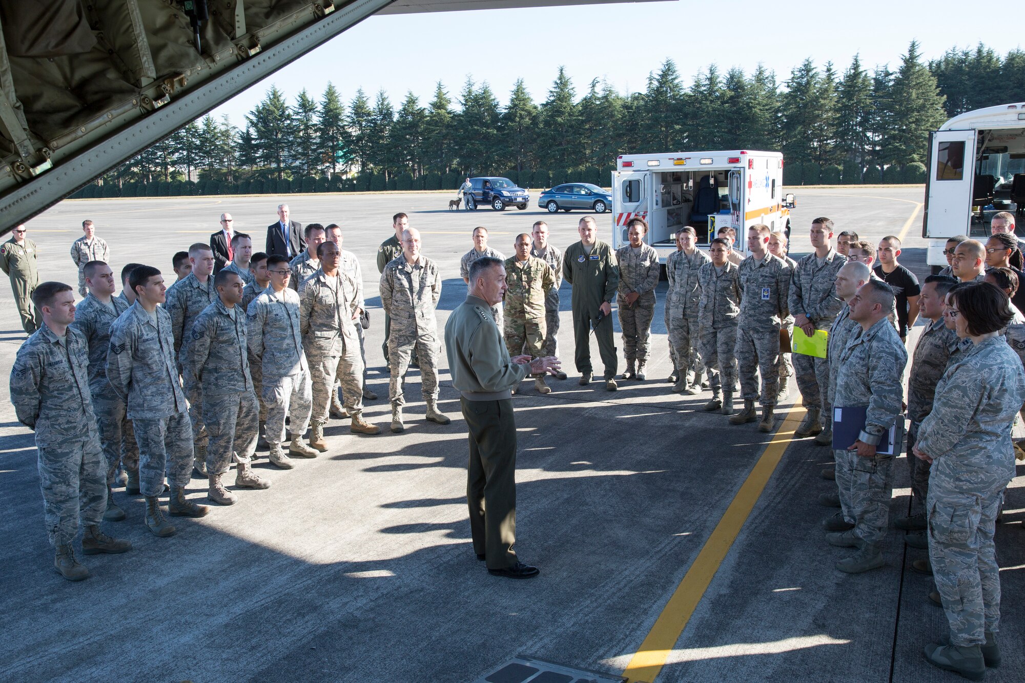Marine Corps Gen. Joseph F. Dunford, the chairman of the Joint Chiefs of Staff, speaks with Airmen at Yokota Air Base, Japan, Nov. 4, 2015. Dunford commented on the importance of readiness to the Airmen, who were conducting aeromedical evacuation training. (U.S. Air Force photo by Osakabe Yasuo/Released)