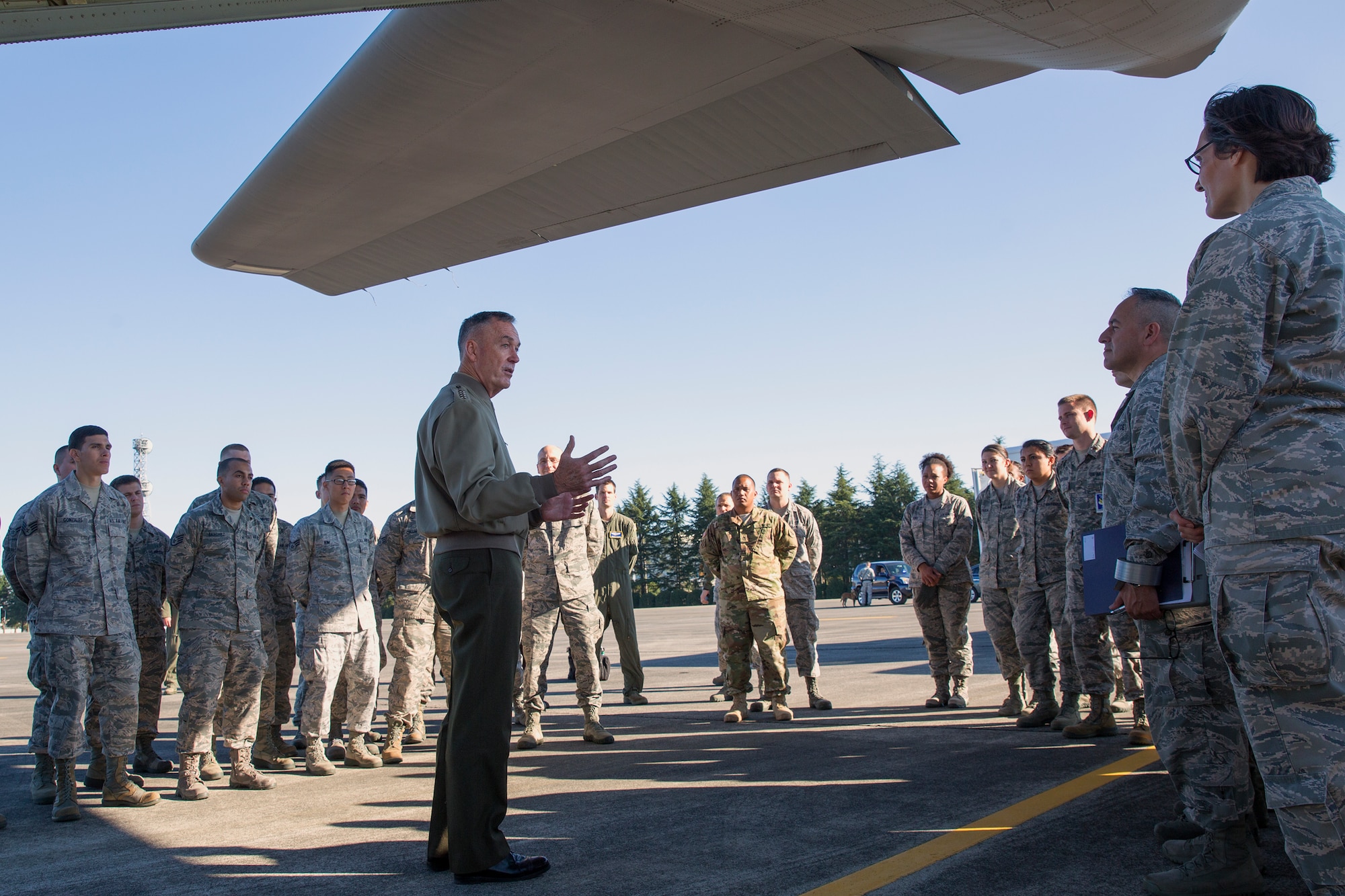 Marine Corps Gen. Joseph F. Dunford, the chairman of the Joint Chiefs of Staff, speaks with Airmen at Yokota Air Base, Japan, Nov. 4, 2015. Dunford discussed the importance of readiness with the Airmen, who were conducting aeromedical evacuation training. (U.S. Air Force photo by Osakabe Yasuo/Released)