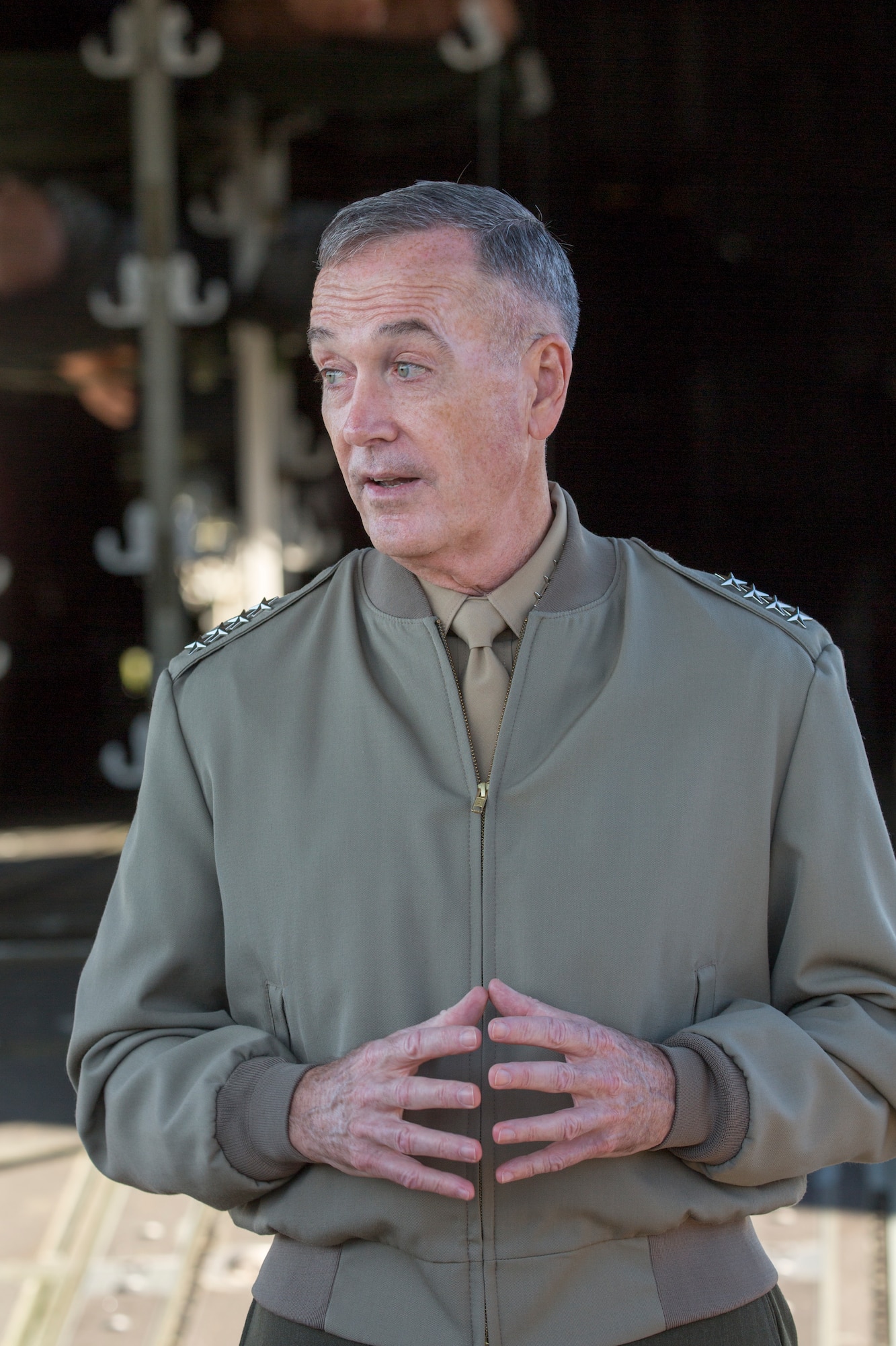 Marine Corps Gen. Joseph F. Dunford, the chairman of the Joint Chiefs of Staff, speaks with Airmen at Yokota Air Base, Japan, Nov. 4, 2015. Dunford spent two days in Tokyo visiting members of the Japan Self-Defense Force as well as members of Team Yokota while witnessing their mission first-hand. (U.S. Air Force photo by Osakabe Yasuo/Released)