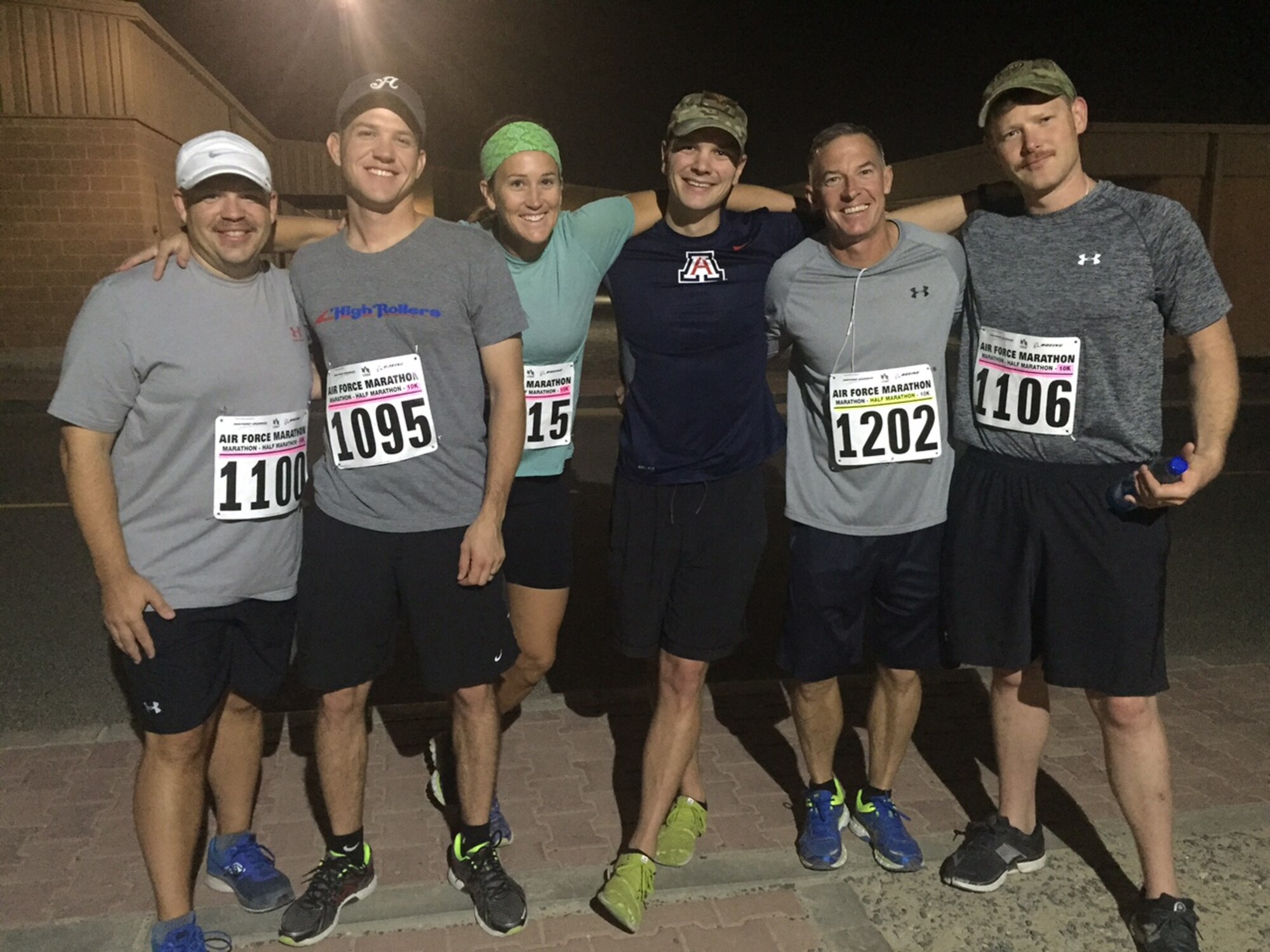 High Roller Deployers, (from left to right), Maj. Jason Little, Master Sgt. Lyle Smith, Capt. Merridy Stephenson, Capt. Reed Kobernick, Chief Master Sgt. Thomas Glover and Capt. Kyle Carraher who all participated in the Deployed Air Force Marathon. Some competed in the Half-Marathon and some competed in the 10K. Stephenson won the female 10K race. (Photo by a unnamed volunteer.)