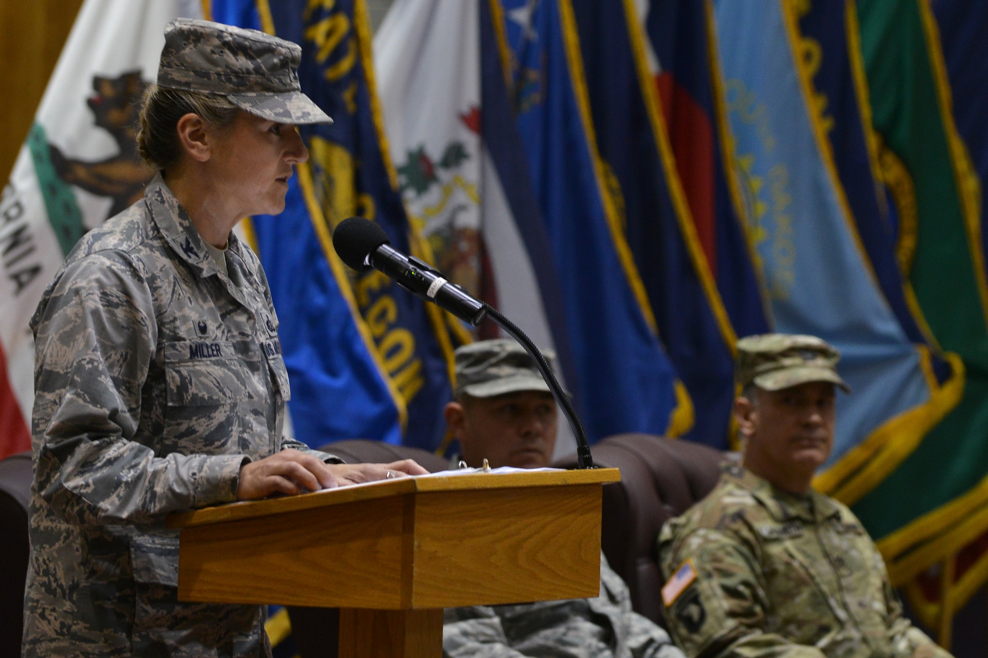 U.S. Air Force Col. Caroline M. Miller, 633rd Air Base Wing commander, speaks about joint base advancements during a merger, activation and deactivation ceremony at Fort Eustis, Va., Nov. 2, 2015. Miller highlighted that the realignment of the force support and logistics readiness squadrons and divisions not only matures the joint base, but exemplifies Joint Base Langley-Eustis’ efforts in working as a team to optimize capabilities and resources. (U.S. Air Force photo by Staff Sgt. Natasha Stannard/Released)