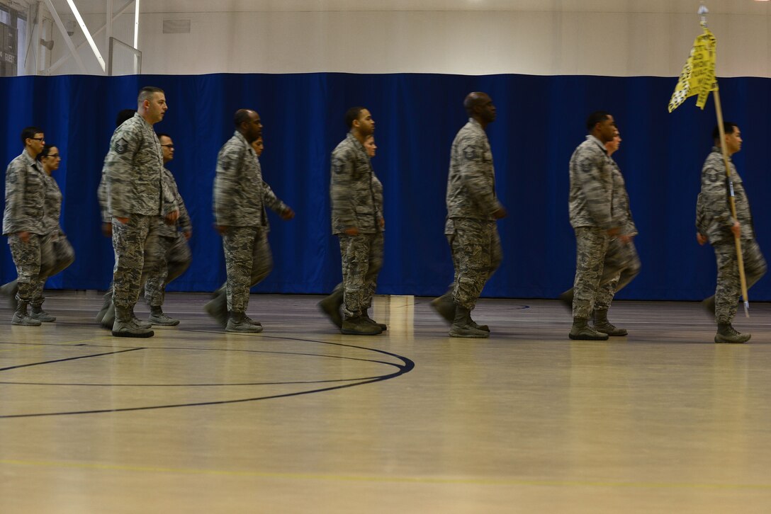 Langley Top Three organization members participate in a drill-off competition at Langley Air Force Base, Va., Oct. 28, 2015. In addition to completing a 30-step sequence, the competitors recited the Airmen’s Creed. (U.S. Air Force photo by Senior Airman Kimberly Nagle/Released)