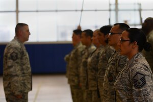 Langley Top Three organization members participate in a drill-off competition at Langley Air Force Base, Va., Oct. 28, 2015. In addition to completing a 30-step sequence, the competitors recited the Airmen’s Creed. (U.S. Air Force photo by Senior Airman Kimberly Nagle/Released)