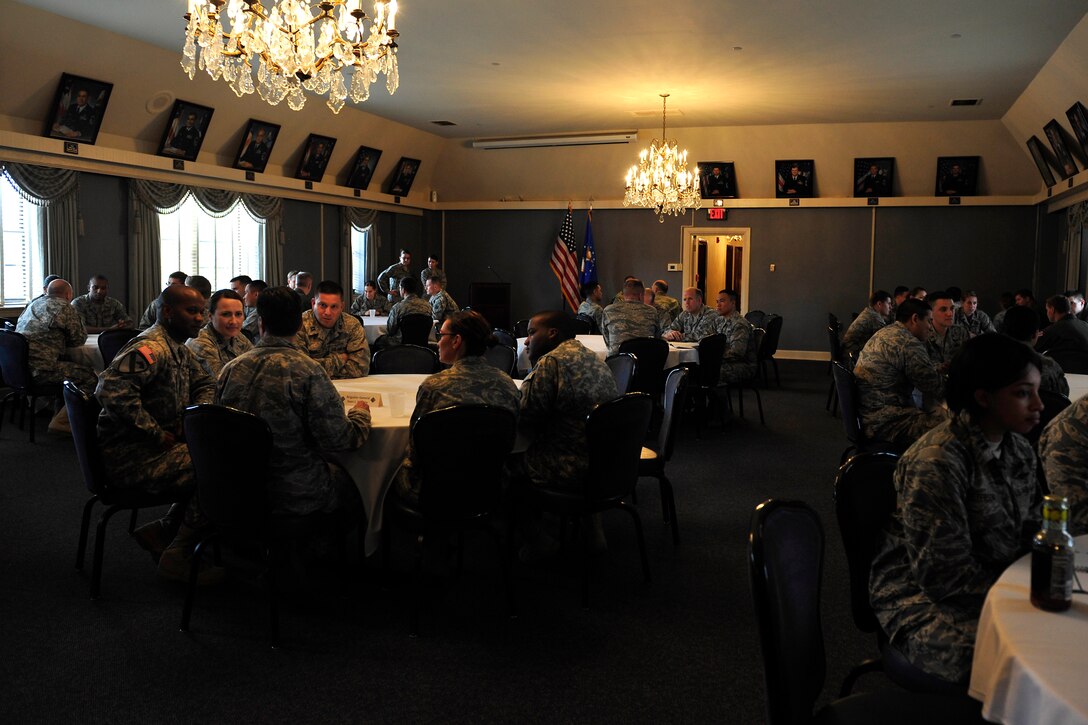 Approximately 66 company grade officers spoke with 10 general officers during a ‘Stars and Bars event at Langley Air Force Base, Va., Oct. 29, 2015. The speed mentoring atmosphere allowed the CGOs to ask questions they may not have had the opportunity to ask before to a general officer. (U.S. Air Force photo by Senior Airman Breonna Veal/ Released)