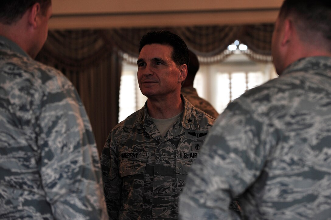 U.S. Air Force Brig. Gen. Sean Murphy, Air Combat Command surgeon general, speaks with company grade officers during a ‘Stars and Bars’ event at Langley Air Force Base, Va., Oct. 29, 2015. Approximately 66 CGOs came to the event to receive mentorship from 10 general officers. (U.S. Air Force photo by Senior Airman Breonna Veal/ Released) 