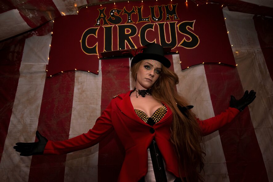 An actor dressed as a circus ring master poses for a photo during the 13th annual haunted house exhibit in base housing on Bitburg Annex, Germany, Oct. 29, 2015. More than 300 base and community members volunteered to decorate and run the event. (U.S. Air Force photo by Staff Sgt. Christopher Ruano/Released)
