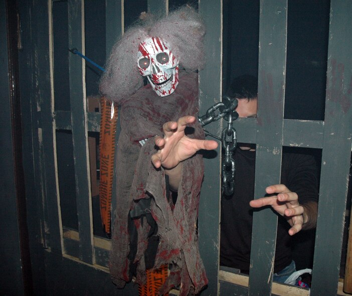 Haunted house entertainers attempt to scare German and American visitors during the 13th annual haunted house exhibit at the Bitburg Annex, Germany, Oct. 31, 2015.  More than 2,000 visitors from the community attended the haunted house during its three-day run. (U.S. Air Force photo by Iris Reiff/Released)