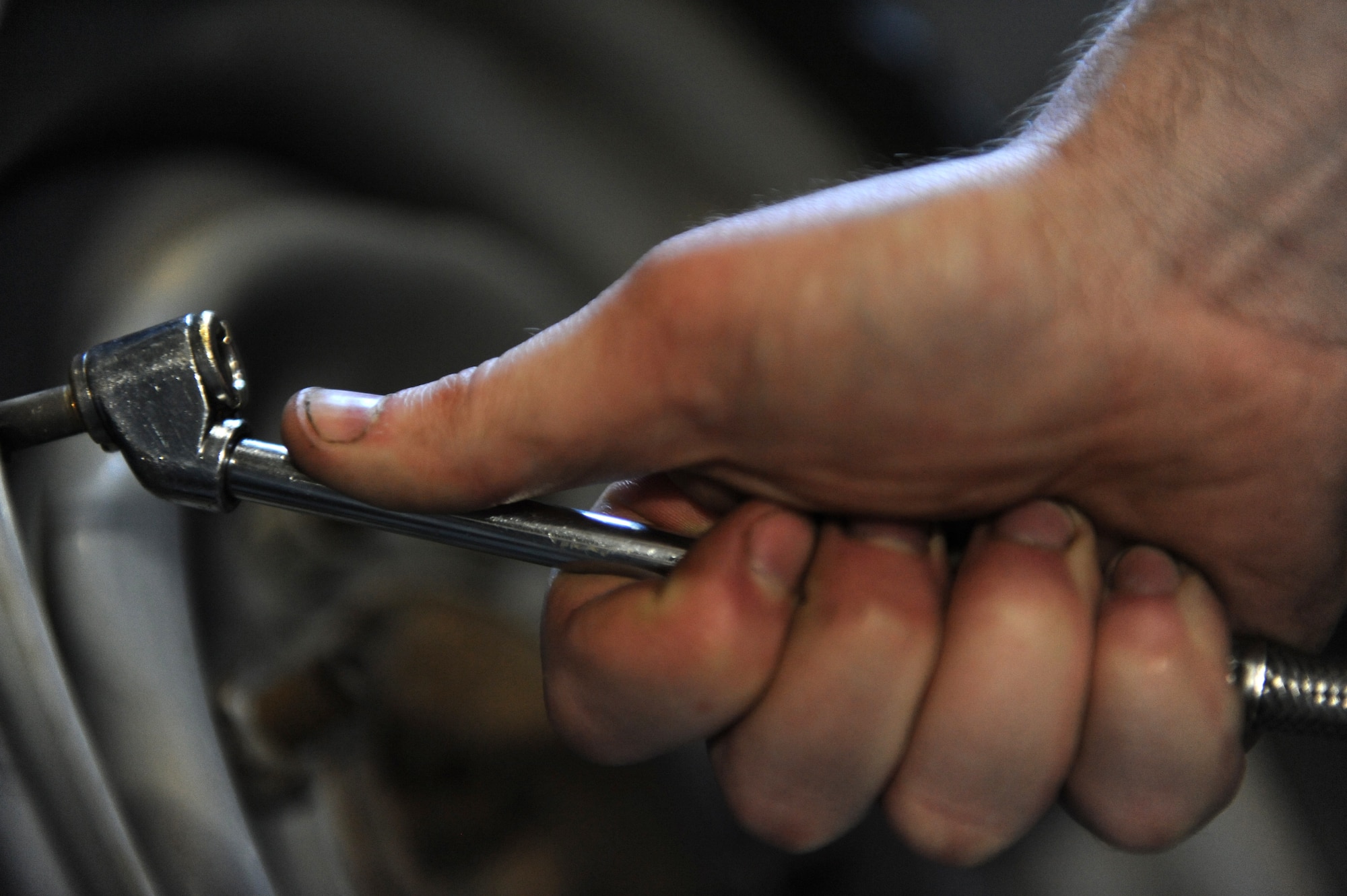 Senior Airman Jeremy Lee, 509th Logistics Readiness Squadron general purpose mechanic, inflates a government vehicle tire as part of preventive maintenance at Whiteman Air Force Base, Mo., Oct. 26, 2015. Preventive maintenance is just one of many duties vehicle maintainers perform to ensure the base’s fleet of vehicles is fully operational. (U.S. Air Force photo by Tech. Sgt. Miguel Lara III/Released)