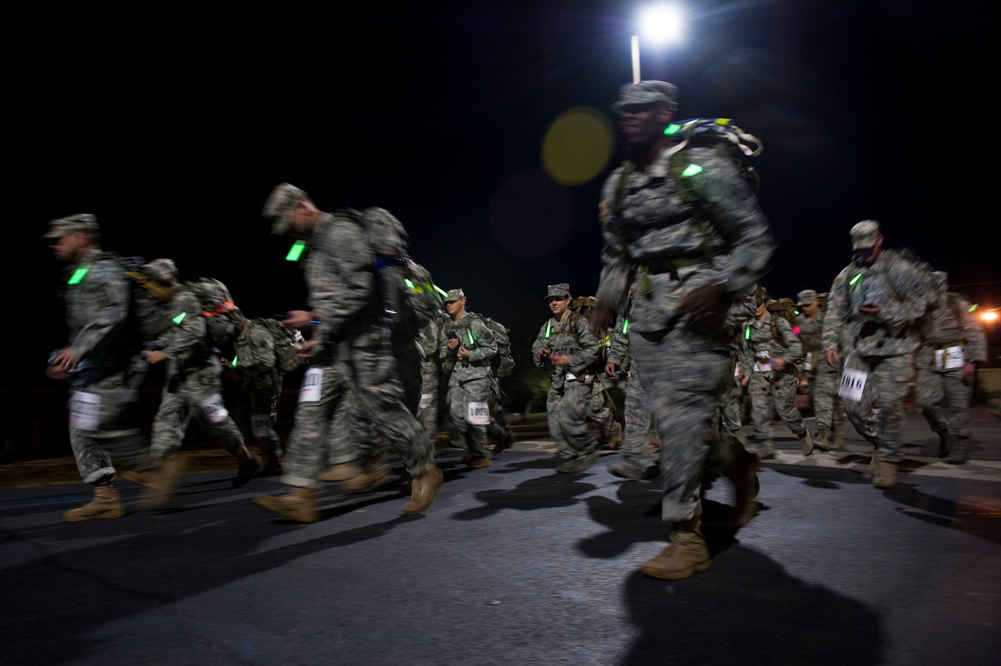 Camp Robinson and Team Little Rock members begin the Norwegian Foot March Oct. 30, 2015, on Camp Robinson in Little Rock, Ark. The Norwegian Foot March is an 18.6-mile march where participants carry a minimum of 25-pound rucksacks and strive to earn the Norwegian Foot March badge. (U.S. Air Force photo by Senior Airman Stephanie Serrano)