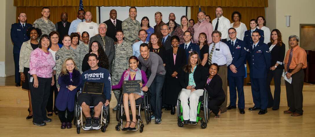 Attendees of this year's 412th Test Wing National Disability Employment Awareness Month luncheon pose for a group photo Oct. 28. (U.S. Air Force photo by Rebecca Amber)

