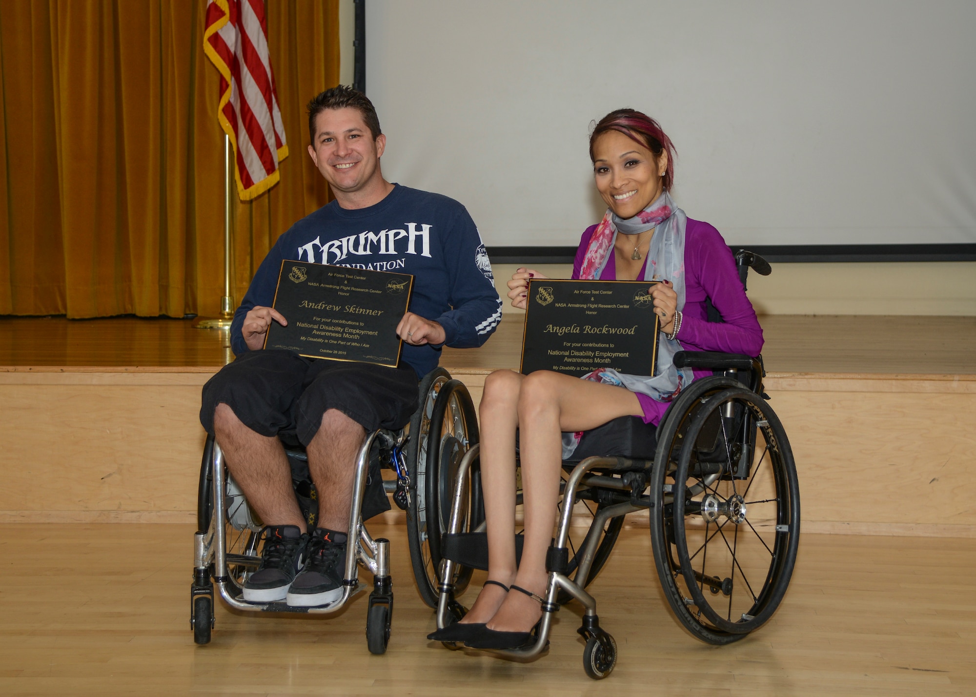 Andrew Skinner and Angela Rockwood were honored for being the guest speakers at this year's 412th Test Wing National Disability Employment Awareness Month luncheon Oct. 28. Both are survivors of accidents that left them quadriplegic. In spite of their injuries, both Rockwood and Skinner found strength in their situations. (U.S. Air Force photo by Rebecca Amber)

