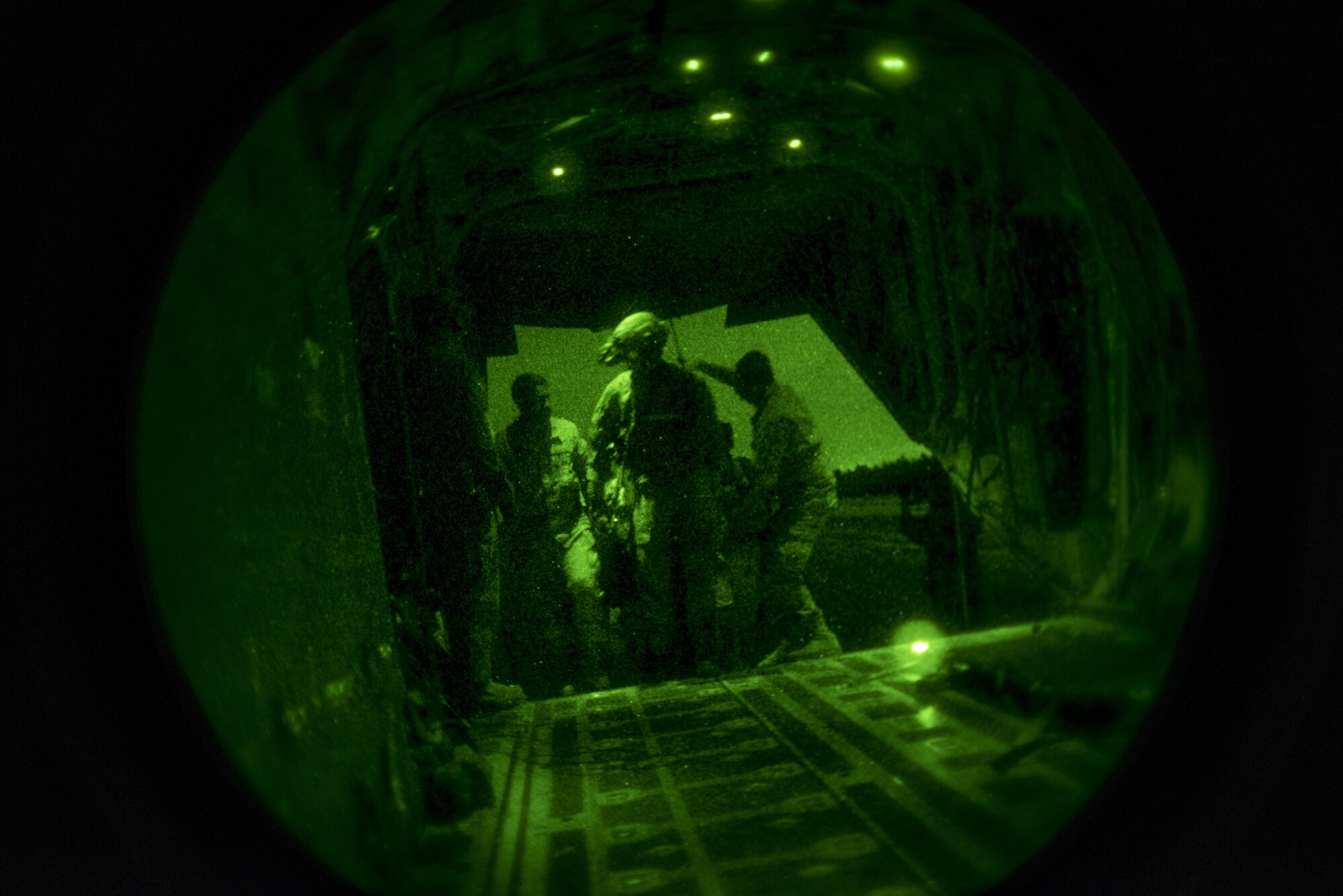 U.S. and Spanish air commandos work together to load a patient with a simulated gunshot wound on an MC-130J Commando II from the 352d Special Operations Wing during TRIDENT JUNCTURE, Nov. 2, 2015. The exercise involved U.S. and Spanish air commandos completing a rapid exfiltration from a remote airfield under simulated fire. (U.S. Air Force photo by 1st Lt. Chris Sullivan/Released)