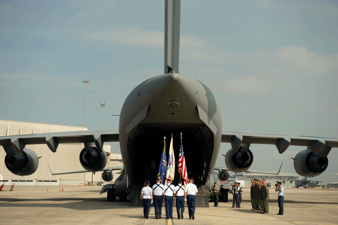 A joint color guard team participates in a repatriation ceremony for the remains of a recovered American World War II era aircrew in Subang, Malaysia, Nov. 5, 2015. U.S. Defense Decretary Ash Carter attended the event. DoD photo by U.S. Air Force Senior Master Sgt. Adrian Cadiz