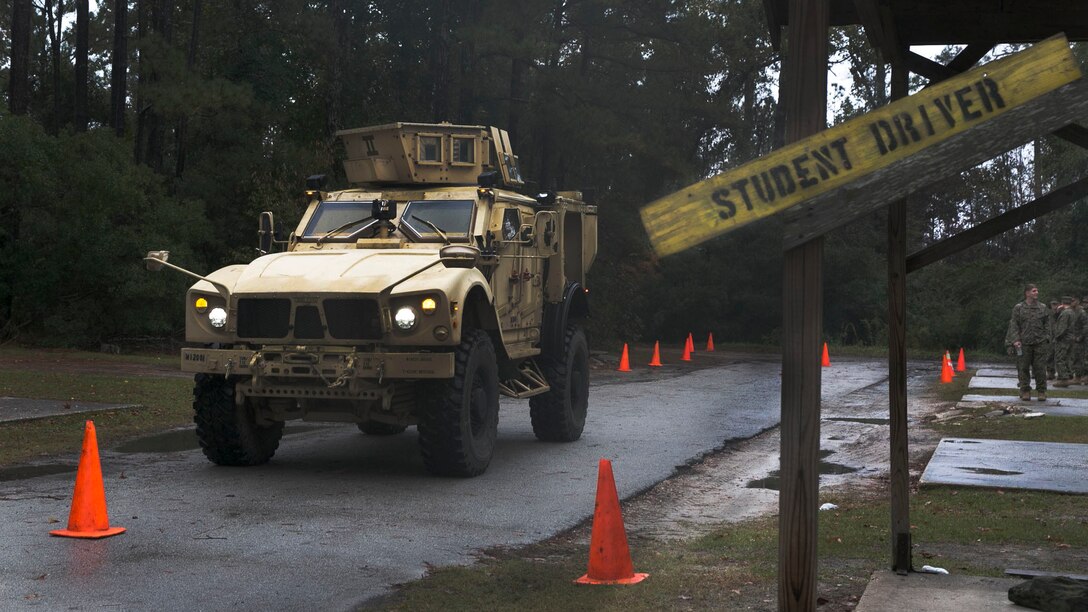 A student driver performs a driving test in a Mine Resistant Ambush Protected All-Terrain Vehicle during a licensing course at Marine Corps Base Camp Lejeune, N.C., Nov. 3, 2015. The course trains Marines how to drive various tactical vehicles used within the Marine Corps. 
