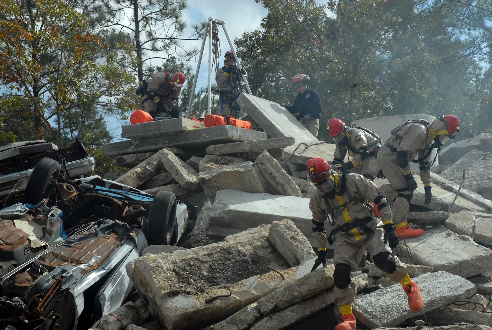 The Florida and Georgia National Guard's Chemical, Biological, Radiological, Nuclear and High-Yield Explosive Enhanced Response Force Packages and the newly-formed Georgia National Guard Homeland Response Force respond to a disaster scenario during an evaluation during training at Camp Blanding Joint Training Center, Fla., on Nov. 17, 2011.