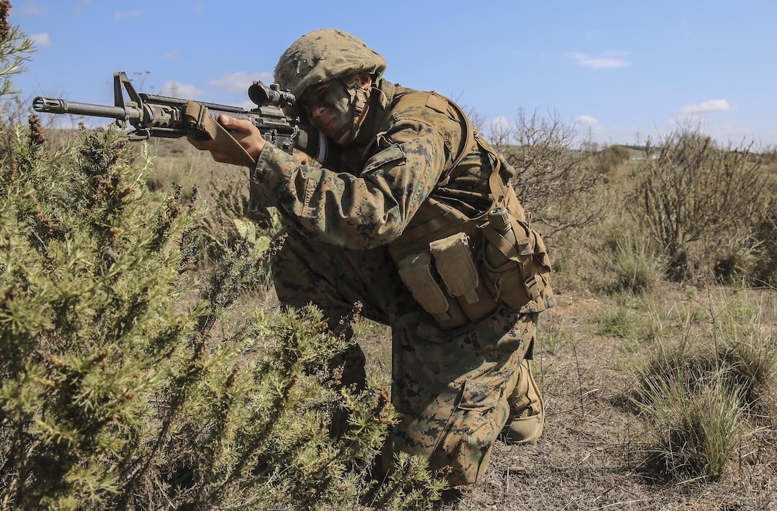 Private First Class Aldrich C. Servilla, Echo Company, 2nd Recruit Training Battalion, provides security during the Crucible at Edson Range, Marine Corps Base Camp Pendleton, Calif., Oct. 20. Servilla will be a Reserve Marine and plans to go back to college in San Francisco to earn his master’s degree in business administration. After completing his MBA, he plans to take on yet another challenge by applying for Officer Candidate School to become an officer in the Marine Corps. Today, all males recruited west of the Mississippi are trained at MCRD San Diego. The depot is responsible for training more than 16,000 recruits annually. Echo Company is scheduled to graduate Oct. 30. 