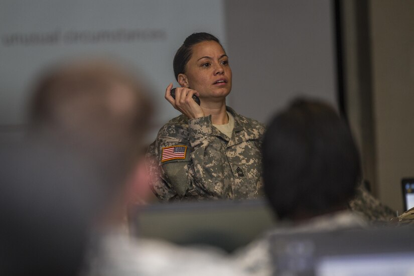 Master Sgt. Sandra Cook, U.S. Army Reserve Command House Services Branch noncommissioned officer in charge, speaks to a group of Soldiers from the 108th Training Command (IET) who will serve as medical readiness coordinators for their units about line of duty reports during a two-day pilot workshop known as Project Arrive Ready in Charlotte, N.C., Nov. 3, 2015. (U.S. Army photo by Sgt. 1st Class Brian Hamilton)