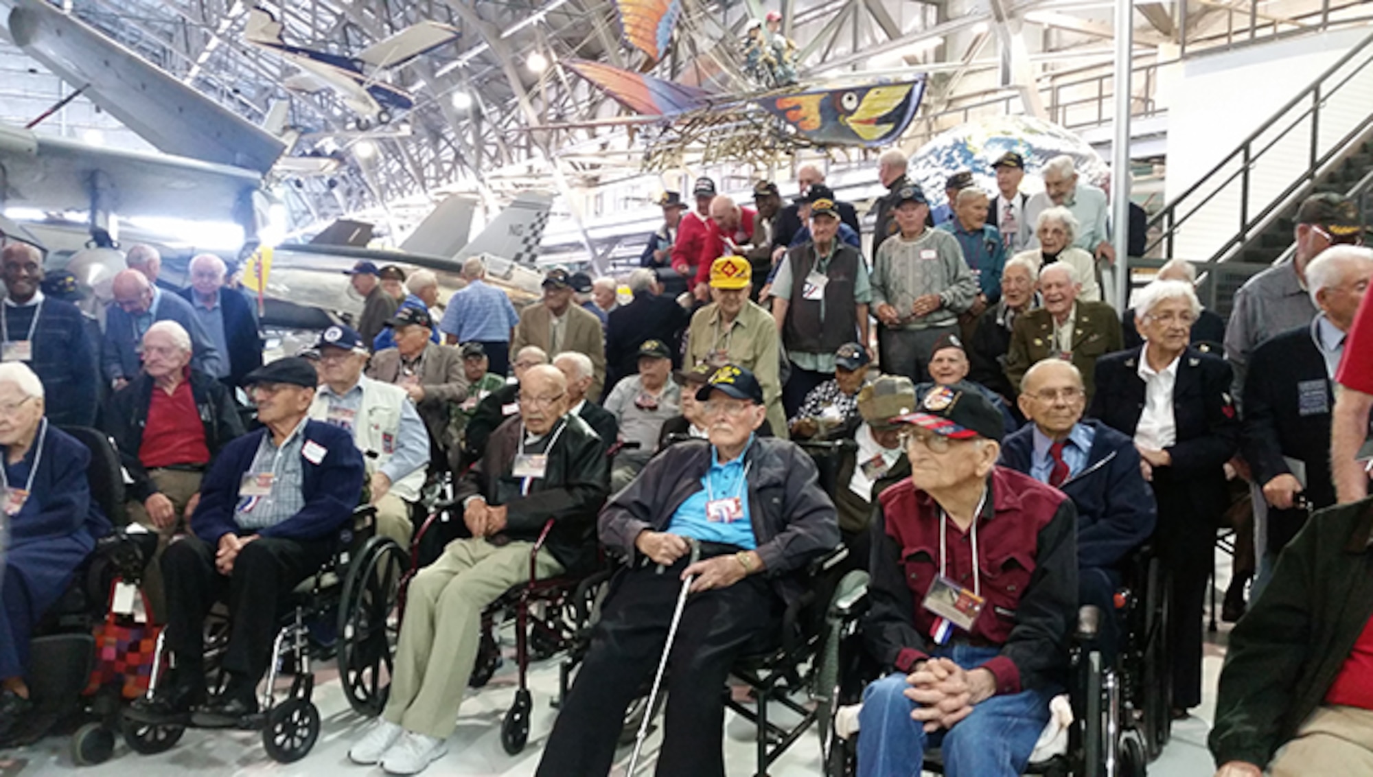 Veterans and their spouses attended the 21st Annual Veterans Salute held at the Wings Over the Rockies Air and Space Museum take their  Nov. 4, 2015, in Denver. (U.S. Air Force photo/Naomi Colwell)