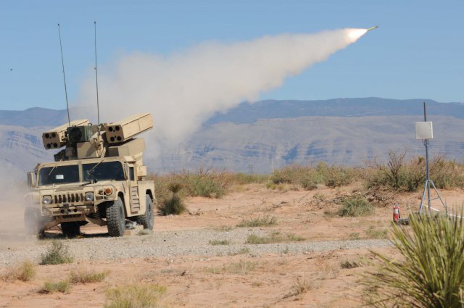Soldiers from 2nd Battalion, 263rd Air Defense Artillery, South Carolina National Guard, send a stinger missile downrange from the Humvee-mounted Avenger missile system at Range 91 near Oro Grande, N.M., Oct. 23, 2011.
