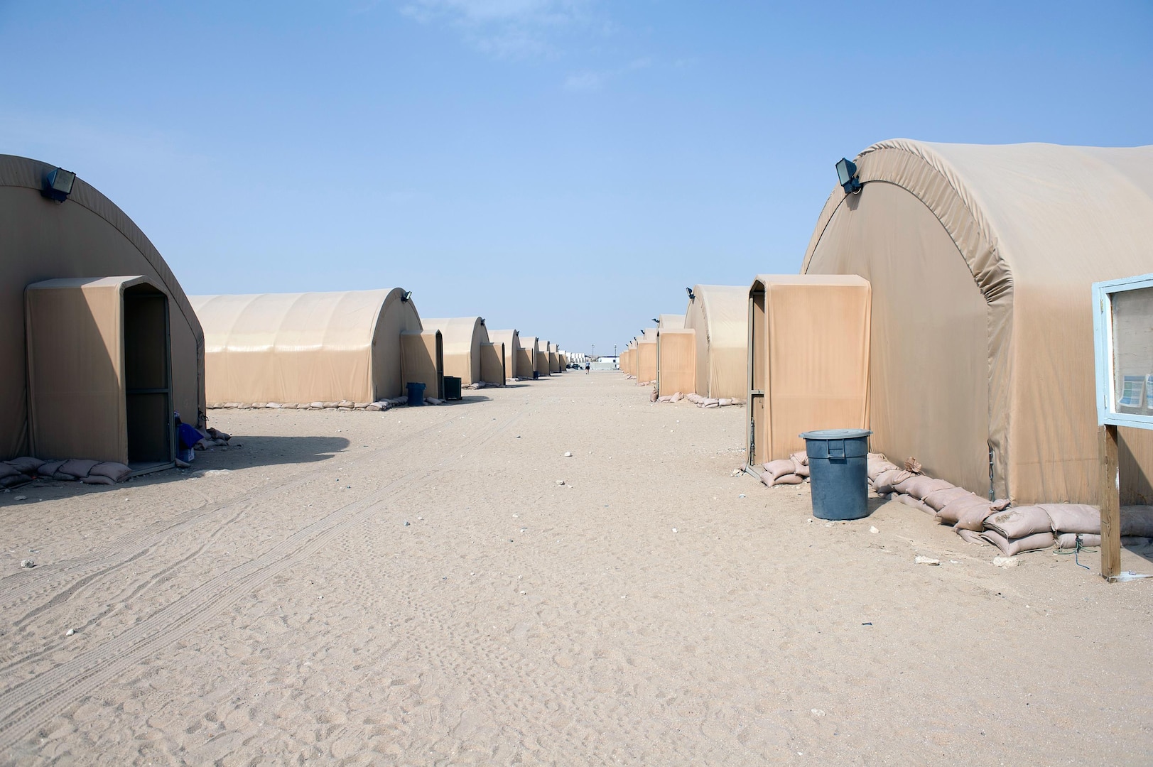 Transient tents at Camp Virginia in Kuwait house units coming out of Iraq in time for the Dec. 31, 2011 drawdown deadline. Camp Virginia's Camp Command Cell, 134th Brigade Support Battalion, Minnesota National Guard, is responsible for forecasting billeting numbers to ensure proper housing is available for the units as they make their way back home.