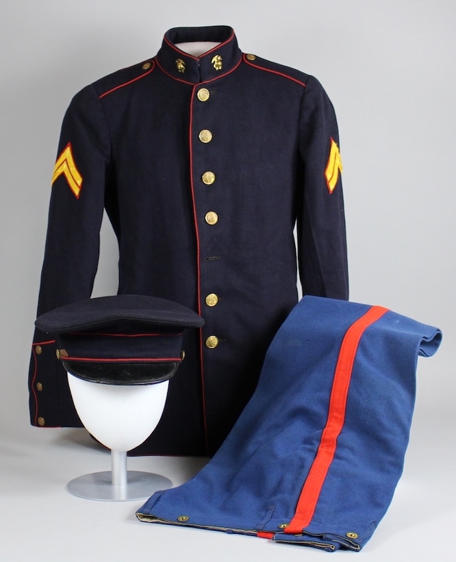 Cpl. Waldemar Jabs's 1920s-era dress blue uniform. The era is notable because it is the first period in Marine Corps history in which enlisted men wore the eagle, globe, and anchor collar ornaments on their dress and service uniforms.