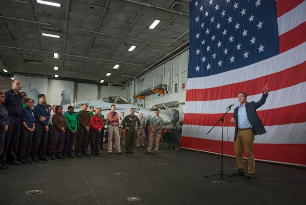 U.S. Defense Secretary Ash Carter speaks with U.S. service members aboard the USS Theodore Roosevelt during a visit to the aircraft carrier at sea, Nov. 5, 2015. Malaysian Defense Minister Hishammuddin Hussein accompanied Carter during the visit. DoD photo by Air Force Senior Master Sgt. Adrian Cadiz 