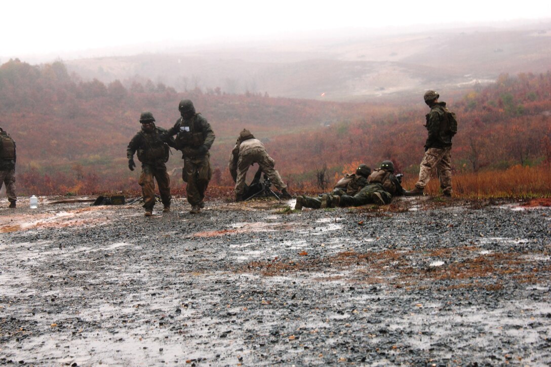 Heavy rains and chilly temperatures were no match for the lieutenants of Echo Company who executed a crew served weapons range Oct. 29 aboard Marine Corps Base Quantico. The weapons range is part of the training that each Marine officer receives at The Basic School.