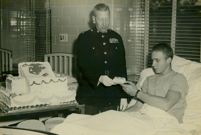 "Although hospitalized Marines were not able to participate actively in the celebration, they did enjoy birthday cake. Colonel F.N. Reeve, Assistant Chief of Staff, G-1, presents a piece of cake to a patient in the U.S. Naval Hospital, Beaufort, South Carolina."
 
From the Marion Fischer Collection (COLL/858) at the Marine Corps Archives and Special Collections
 
OFFICIAL USMC PHOTOGRAPH