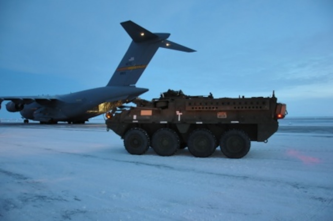 U.S. Army Alaska Stryker vehicles from Bravo Company, 3rd Battalion, 21st Infantry Regiment, 1st Stryker Brigade Combat Team, unload from an Air Force C-17 Globemaster III above the Arctic Circle as part of Operation Arctic Pegasus at Deadhorse, Alaska, Nov. 3, 2015. U.S. Army photo by Sgt. Joel Gibson