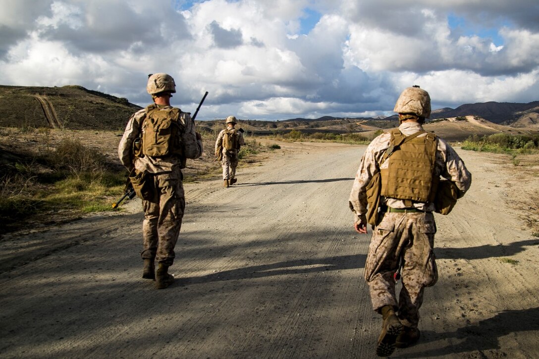 U.S. Marines with Battalion Landing Team 2/1, 13th Marine Expeditionary Unit (MEU), move toward a checkpoint while conducting an amphibious assault during Composite Training Unit Exercise (COMPTUEX) at Marine Corps Base Camp Pendleton, Calif., Nov. 3, 2015. COMPTUEX provides the MEU ARG the opportunity to integrate naval training while also allowing focused, mission-specific training and evaluation for the Marines and their Navy counterparts. (U.S. Marine Corps photo by Cpl. Briauna Birl/RELEASED)